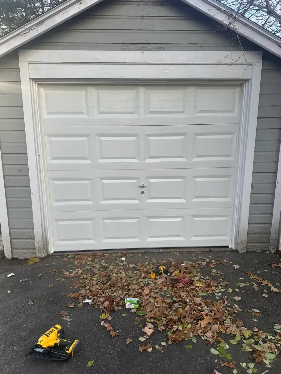 Gray detached one-car garage